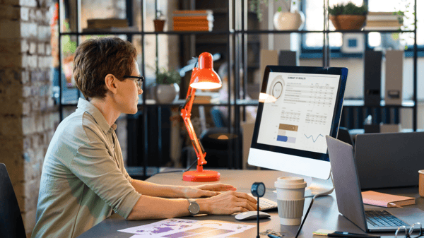 Woman Researching At Desk