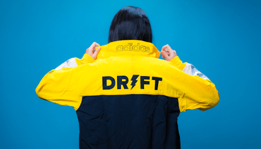 Woman Wearing a Yellow and Black Adidas Drift Jacket