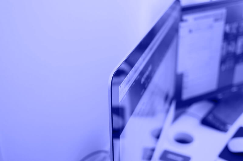 Blue Image of Two Computer Screens